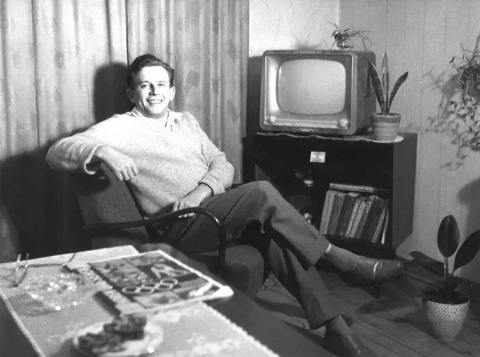 Framed Print : Man in his living room, 1950s, ca Framed Print : Man in his living room, 1950s, ca