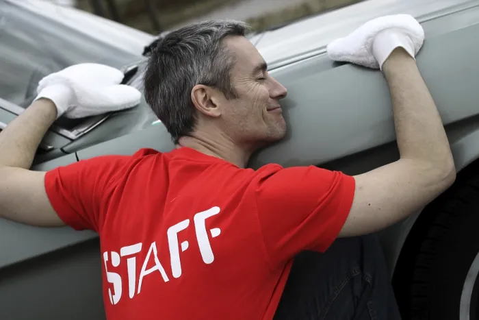 Framed Print : Man lovingly caring for his vintage car