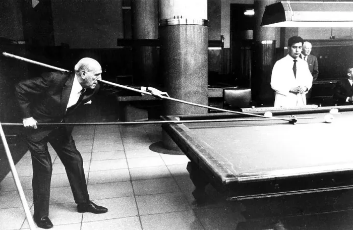 Framed Print : Man playing with long cue billiard Framed Print : Man playing with long cue billiard