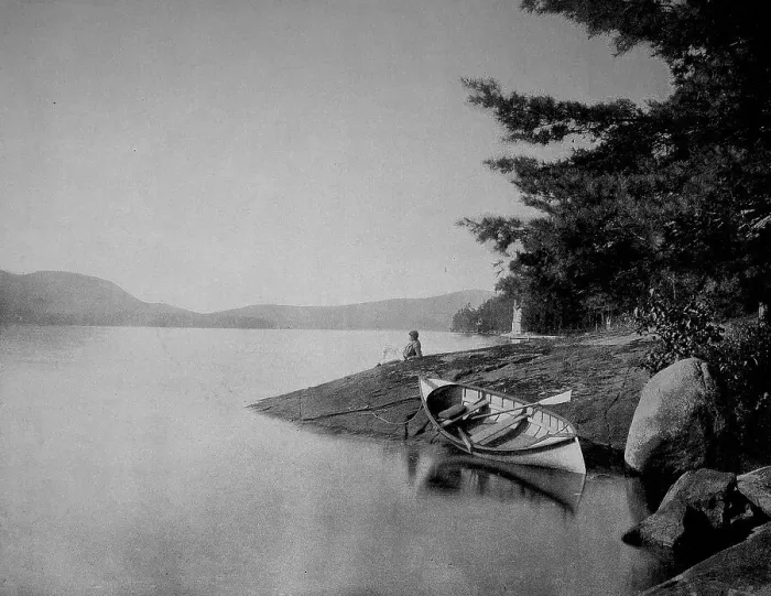 Framed Print : Man relaxing on the shore looking a Framed Print : Man relaxing on the shore looking a