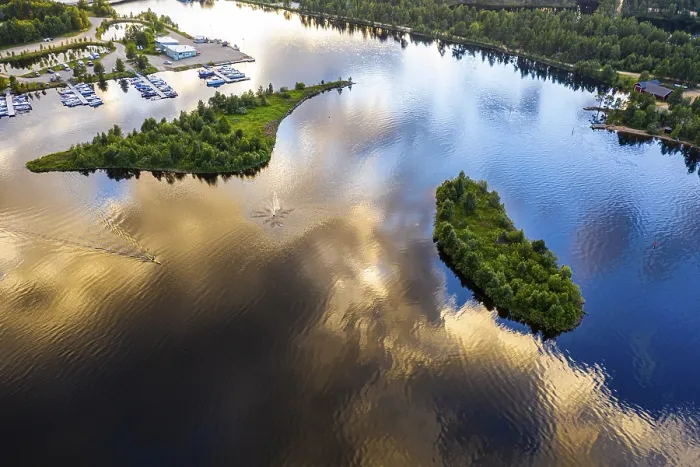 Framed Print : Man rowing a cayak at sunset, Lake Inari