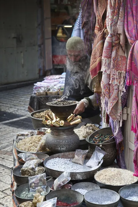 Framed Print : A man selling spices in the ancient city of Jerusalem in Israel