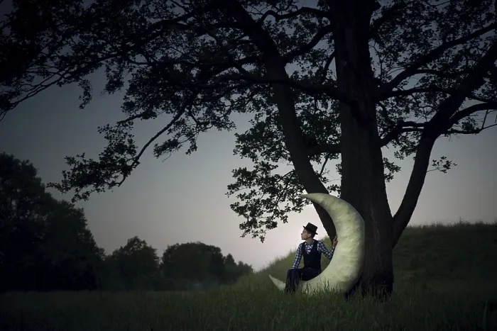 Framed Print : Man sitting in the moon, crescent moon Framed Print : Man sitting in the moon, crescent moon