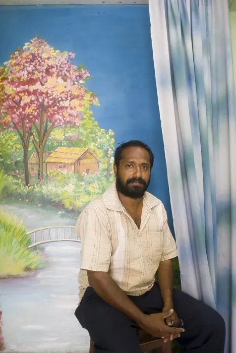 Framed Print : Man sitting in photo studio at Pondicherry Union Territory