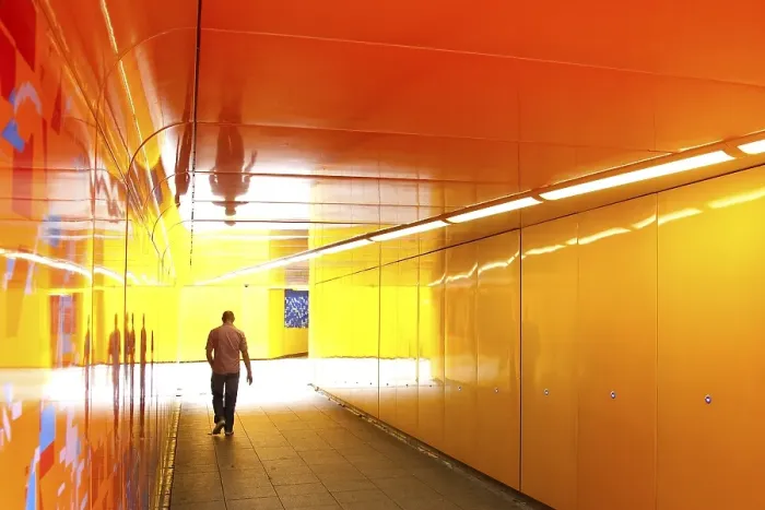 Framed Print : Man walking through an underpass in London Framed Print : Man walking through an underpass in London