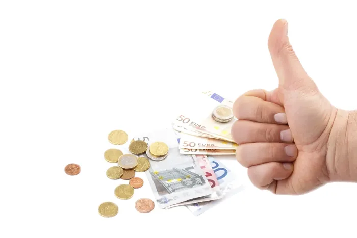 Framed Print : Man's hand with thumb up and money isolated on white Man's hand with thumb up and money isolated on white
