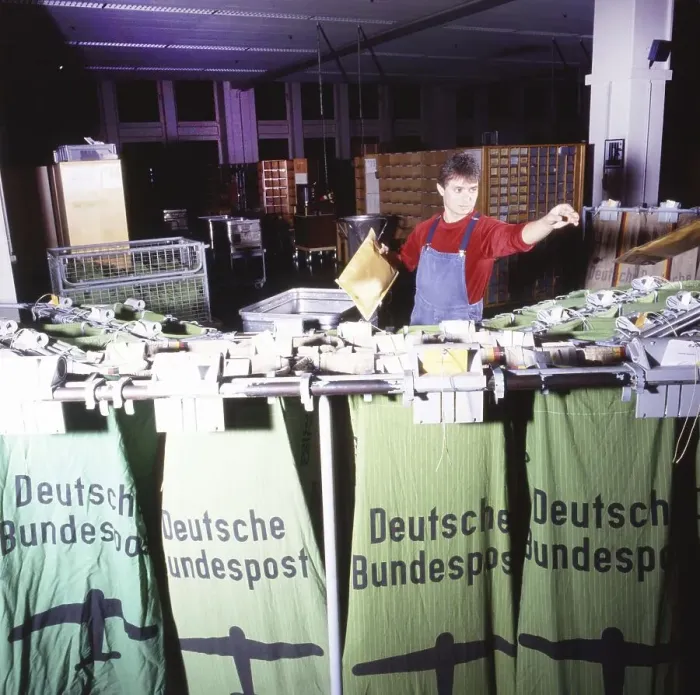 Framed Print : Manual sorting worker at the post office, Dortmund Framed Print : Manual sorting worker at the post office, Dortmund