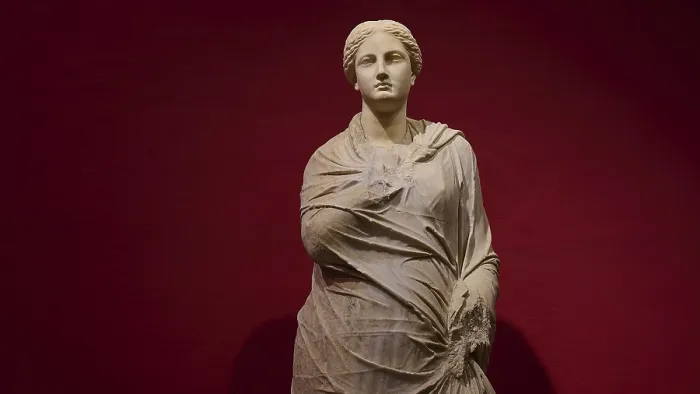 Framed Print : Marble statue of a woman in draped shawls