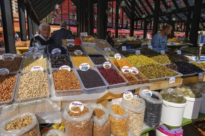 Framed Print : Market hall, stand with nuts, dried fruits and olives