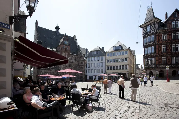 Framed Print : Marketplace with restaurants, town hall on the left Framed Print : Marketplace with restaurants, town hall on the left