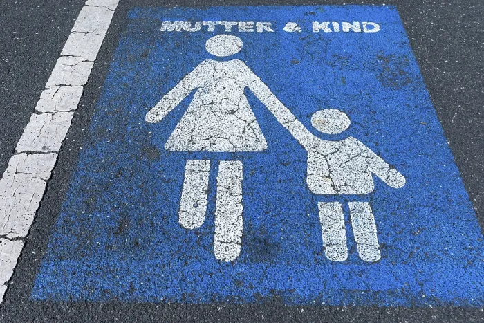 Framed Print : Marking on tar, parking lot for mother and child Framed Print : Marking on tar, parking lot for mother and child