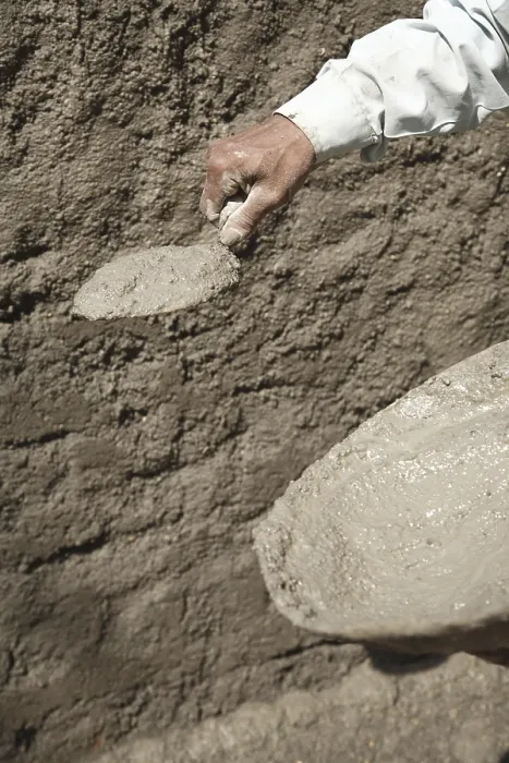 Framed Print : Mason using patter and trowel for plastering mixture of cement on wall Framed Print : Mason using patter and trowel for plastering mixture of cement on wall