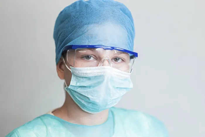 Framed Print : Medical staff wearing a facemask