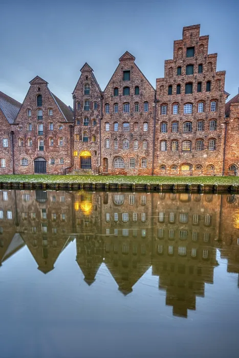 Framed Print : The medieval salt warehouse with the river Trave at dawn Framed Print : The medieval salt warehouse with the river Trave at dawn