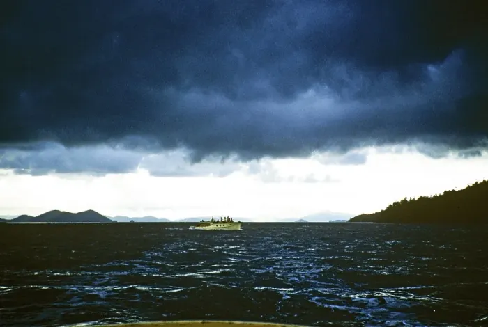 Framed Print : Melbourne Grammar School expedition to Queensland, Australia, 1956 boat trip with stormy skies thought to be the Whitsunday Islands, Oceania