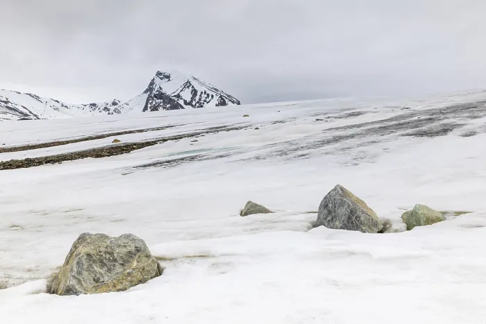 Framed Print : Melting glacier, stones, water
