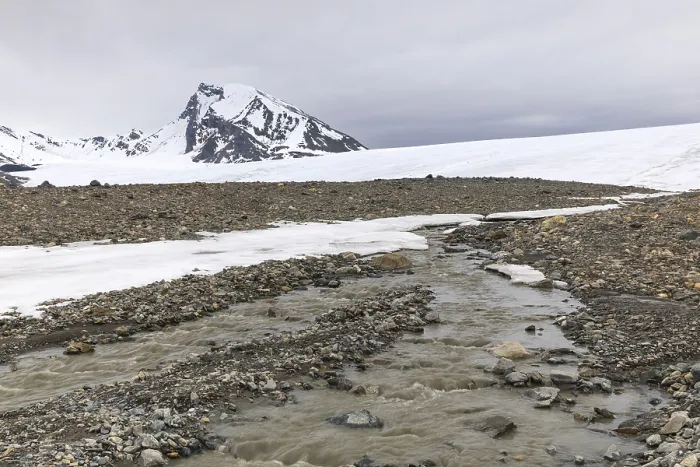 Framed Print : Melting glacier, stones, water