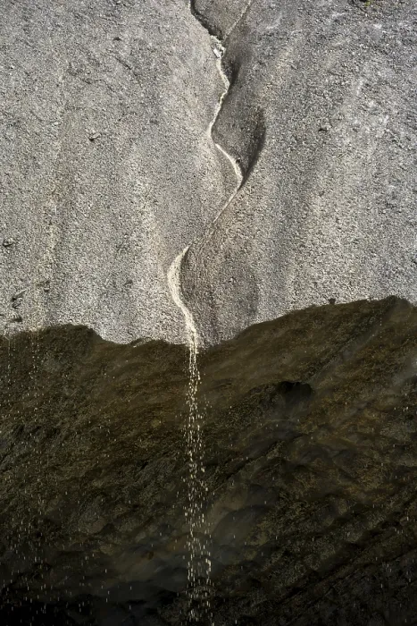 Framed Print : Meltwater at a glacier cave, underground glacier stream