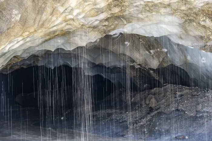 Framed Print : Meltwater at a glacier cave, underground glacier stream