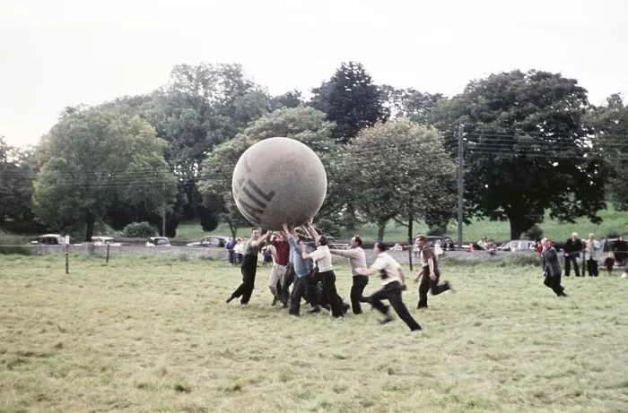 Framed Print : Men playing a game with a giant Daily Mail push ball on a field, Northern Ireland, late 1950s, circa 1960s Framed Print : Men playing a game with a giant Daily Mail push ball on a field, Northern Ireland, late 1950s, circa 1960s