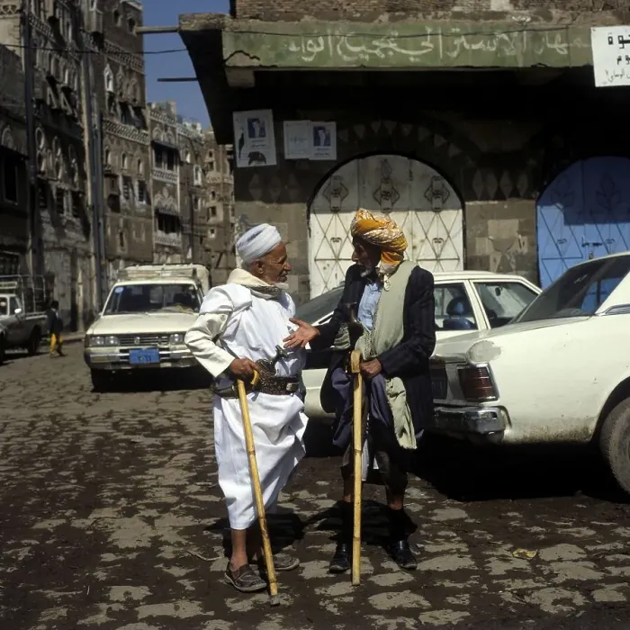 Framed Print : Two men talking in the old town of Sanaa, Yemen, Asia