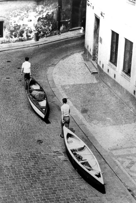 Framed Print : Men transport canoes, circa 1970s Framed Print : Men transport canoes, circa 1970s