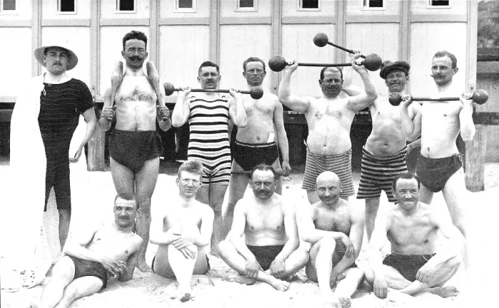 Framed Print : Men's group on the beach with weights Framed Print : Men's group on the beach with weights