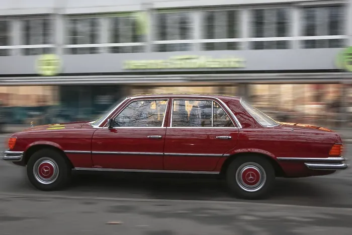 Framed Print : Mercedes-Benz W 116 series, 280 SE classic car from the 70s in red paint