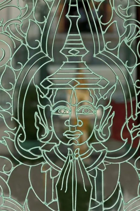 Framed Print : Metal mesh gate with a representation of Buddha in the Royal Palace