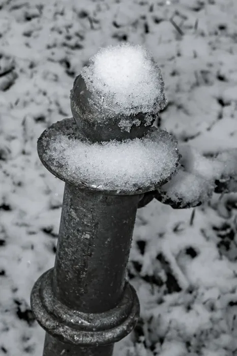Framed Print : Metal pile with snow in the park Framed Print : Metal pile with snow in the park