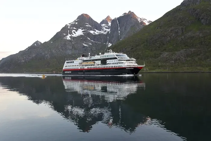 Framed Print : The Midnatsol Hurtigruten passenger ship sailing through Raftsund at midnight