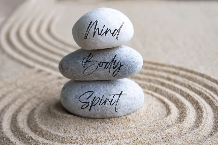 Framed Print : Mind, body and soul text on zen stones with bright light background