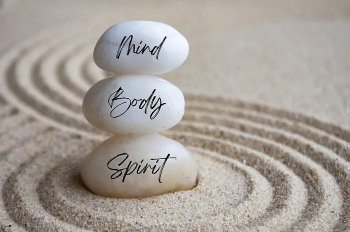 Framed Print : Mind, body and soul text on zen stones with sand background Framed Print : Mind, body and soul text on zen stones with sand background
