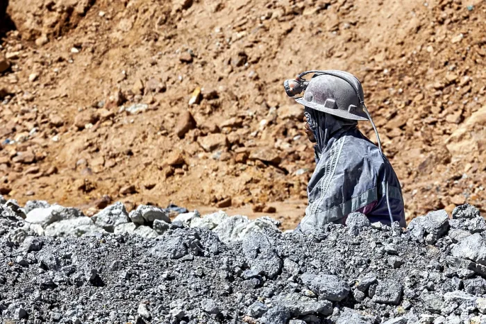 Framed Print : A miner gazes into the distance