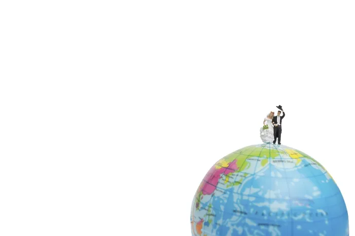 Framed Print : Miniature people wedding, bride and groom couple on The globe on white background Framed Print : Miniature people wedding, bride and groom couple on The globe on white background