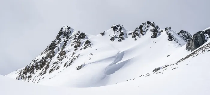 Framed Print : Minimalist winter landscape, white snow and dark mountains on the Scalettahorn