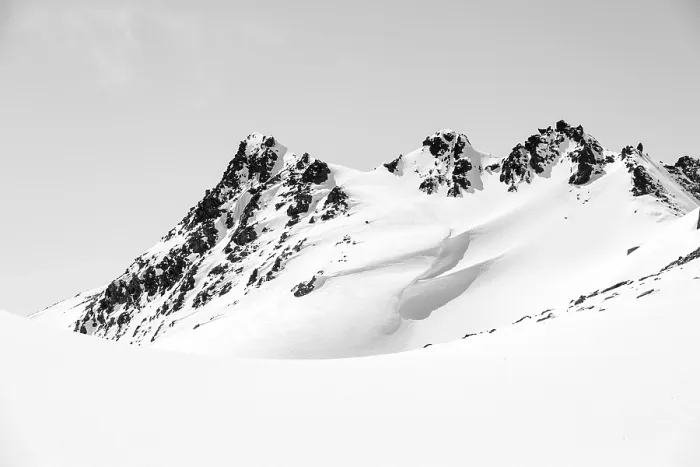 Framed Print : Minimalist winter landscape, white snow and dark mountains on the Scalettahorn Framed Print : Minimalist winter landscape, white snow and dark mountains on the Scalettahorn