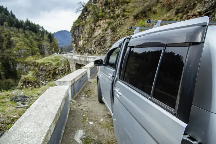 Framed Print : Minivan on a mountain road with scenic views Framed Print : Minivan on a mountain road with scenic views