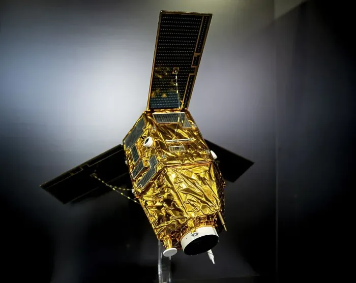 Framed Print : Model of a satellite with solar panel and golden heat protection foil