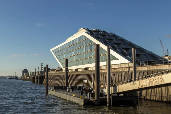 Framed Print : Modern architecture, Dockland office building and ferry dock in the evening light on the Elbe in the port of Hamburg