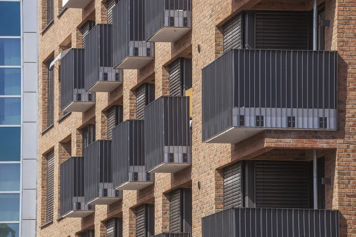 Framed Print : Modern brown brick residential buildings with balconies Framed Print : Modern brown brick residential buildings with balconies