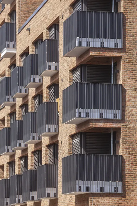 Framed Print : Modern brown brick residential buildings with balconies Framed Print : Modern brown brick residential buildings with balconies