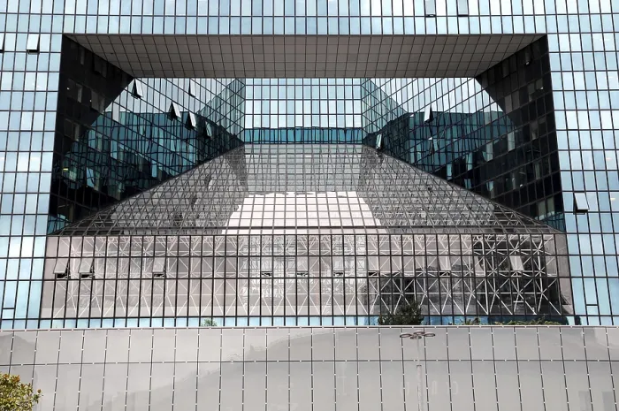 Framed Print : Modern glass architecture with reflective surfaces and geometric shapes in an urban environment