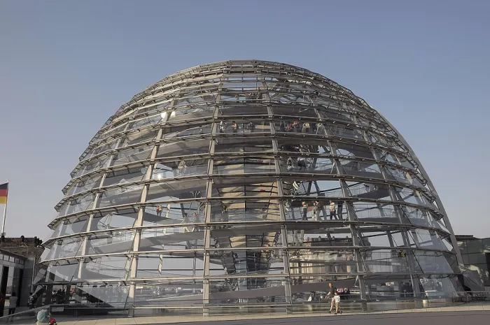 Framed Print : Modern glass dome of the Reichstag building in Berlin with visitors in bright daylight