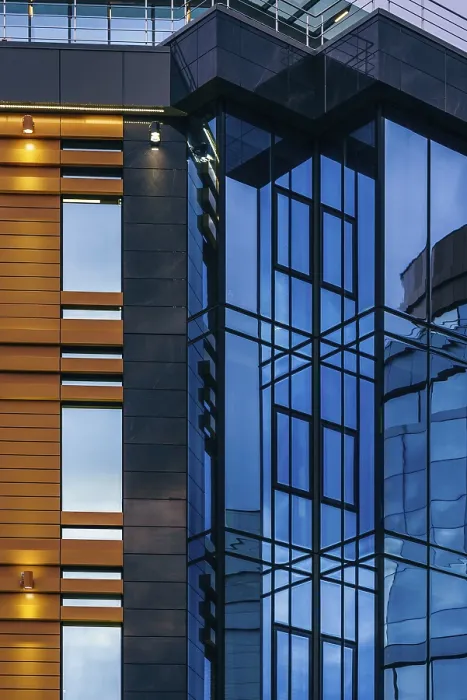Framed Print : Modern high-rise office building with a glass facade Framed Print : Modern high-rise office building with a glass facade