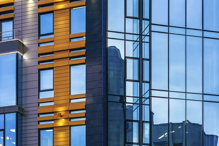 Framed Print : Modern high-rise office building with a glass facade