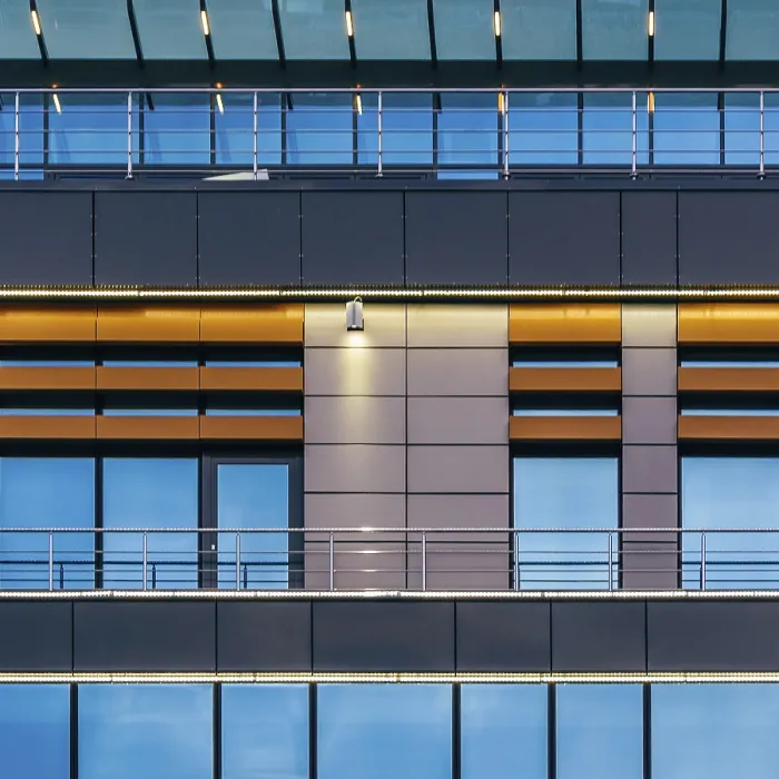 Framed Print : Modern high-rise office building with a glass facade at overcast