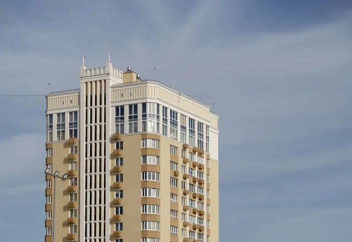 Framed Print : Modern multi-storey building against sky Framed Print : Modern multi-storey building against sky