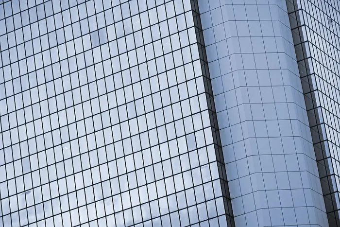 Framed Print : Modern skyscraper exterior with glass and reflection in daytime