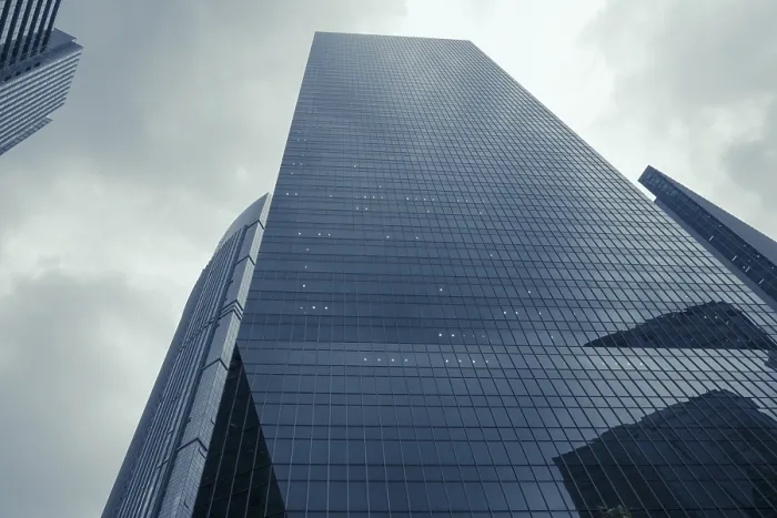 Framed Print : Modern skyscrapers and dramatic rainy sky over them